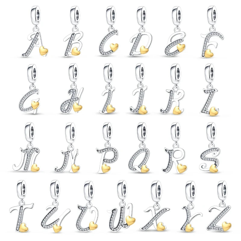 Berloque em Prata 925 - Letras do Alfabeto Cursiva com Coração Dourado
